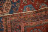 Close-up of the textured Soumac flatweave and reciprocating wave border on an antique Caucasian carpet.
