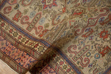 Hand-knotted texture of a vintage Shirvan rug with scrolling ram's horn and Kufic border motifs.