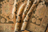 Supple drape of a distressed Turkish Kars rug showing its time-softened floral patterns.