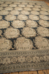 European-influenced Rococo roundels in staggered rows on a distressed antique Persian Tabriz carpet.