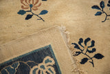 Hand-knotted foundation and unsecured fringe on an antique Chinese Peking carpet.