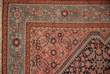 Powder blue border with meandering vines and blossoms on a fine antique Persian Malayer rug corner.