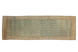 Distressed vintage Malayer runner with a dense boteh pattern and visible abrash in dusty teal and coffee brown.