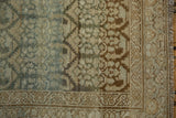 Restored side cord selvage and coffee brown border on the distressed vintage Malayer rug runner.