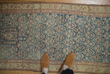 Distressed hand-knotted Antique Kurdish Hamadan runner, dusty sapphire field, red floral pattern.