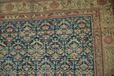 Distressed antique Kurdish Hamadan runner corner; sapphire blue field with geminating plants and ivory border.