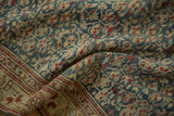 Distressed Kurdish Hamadan runner pile with dusty blue and madder red plant motifs.