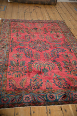 The lustrous, glossy wool pile of an antique Sarouk with weeping willow motifs.