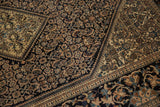 Dense Herati field and intricate ivory corner detail on an antique Farahan Sarouk rug.