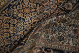Low pile of an antique Farahan Sarouk showing the knot heads and intricate Herati pattern detail.