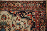 Corner detail showing the unusual mythological dragon spandrel on an antique Farahan Sarouk rug.