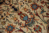 Finely woven vased plant motif with colorful petals on an antique Farahan Sarouk rug's short pile.