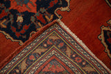 Hand-knotted foundation, secured corner, and dense brick-red pile of a vintage Persian Bijar rug.
