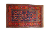 Antique Kurdish Hamadan rug with a navy blue Herati field and a wide tomato red border.