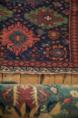 Intricate gul medallions and reciprocating wave border on a collector Soumac runner.