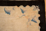 Art Deco carpet border, stylized leaf and ribbon motifs in apricot, mauve, sapphire blue.
