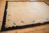 Antique Chinese Art Deco carpet's dark, curvilinear border with sapphire blue motifs.