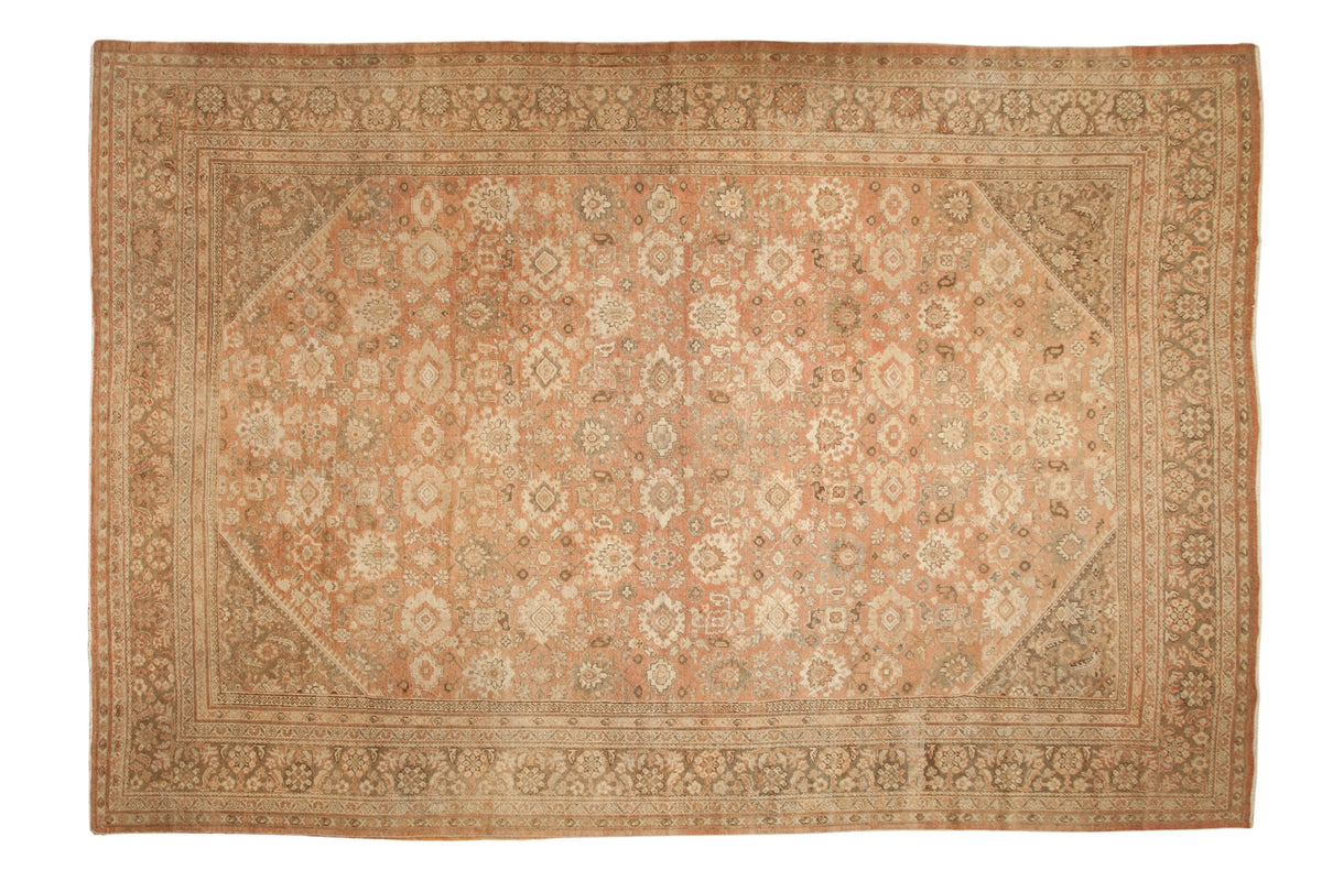 Vintage hand-knotted Mahal carpet, distressed with allover blush and ivory floral palmettes.