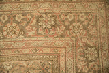 Distressed Mahal carpet corner, with meandering vine borders and antique ivory, dusty blush palmettes.
