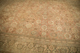 Distressed hand-knotted Mahal carpet detail: dusty blush field, worn floral palmettes, silver-beige border.