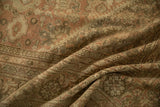 Distressed texture of Persian Mahal carpet with soft floral palmettes in blush, ivory, and beige.