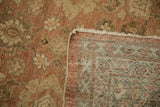 Distressed Mahal rug detail: worn knot heads, visible foundation, dusty blush, ivory selvage and fringe.