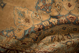 Close-up on the distressed, hand-knotted texture of a Persian Yezd carpet's folds.
