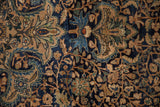 Hand-knotted pile of a vintage Farahan Sarouk showing mostly even wear.