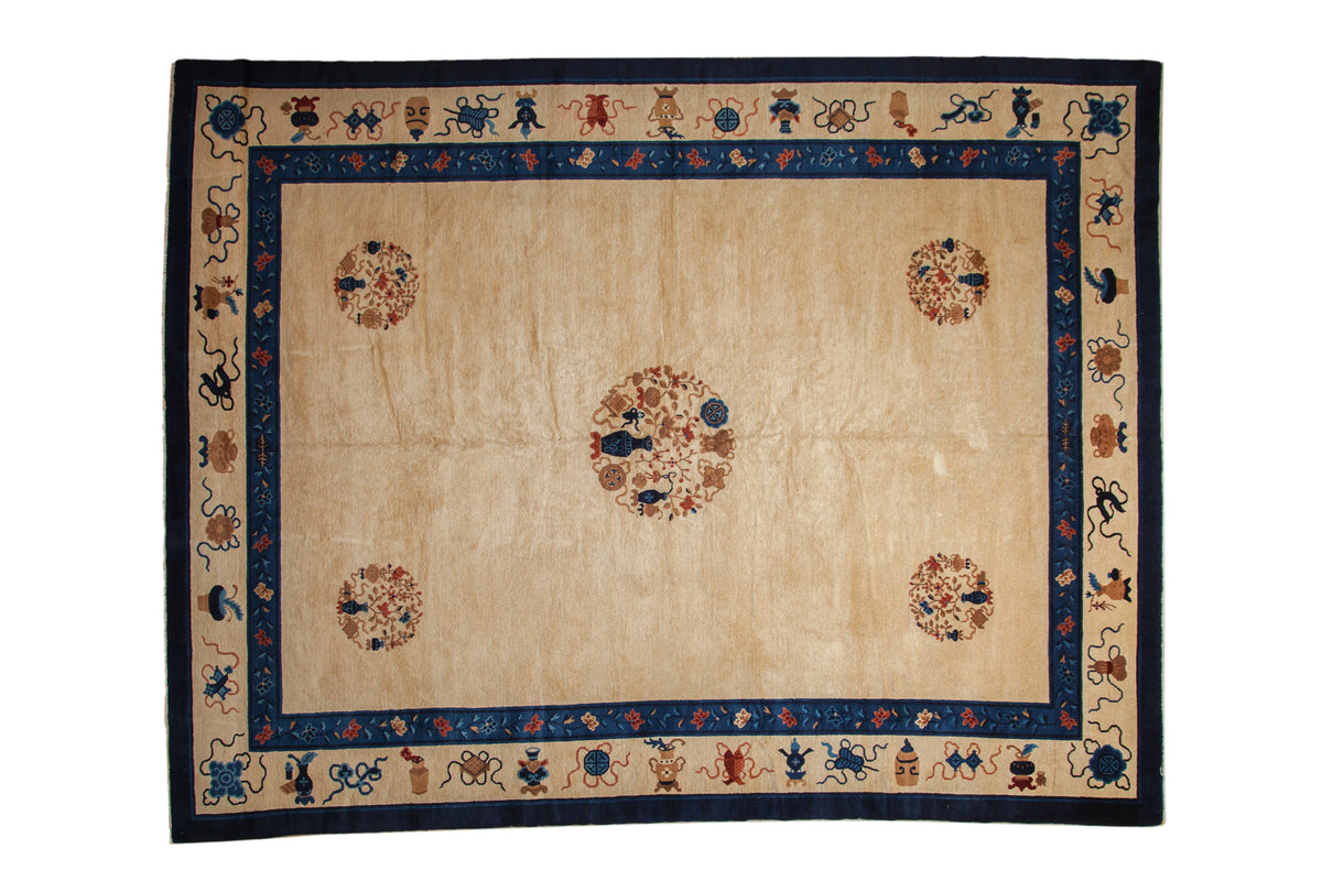 Antique Peking carpet with five roundel medallions on an ivory field, set within a navy blue symbolic border.