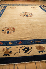 A low perspective highlighting the even, short pile and shadow carving on an antique Peking carpet.