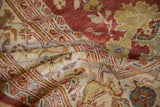 The low pile and exposed knot heads detailing the texture of an antique Persian Mahal carpet.