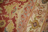 Storied wear and visible foundation on an antique Mahal carpet next to its turtle samovar border.