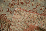 The hand-knotted construction on the reverse side of a distressed vintage Mahal carpet.