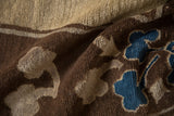 Textured hand-knotted pile of an antique Peking carpet in camel, brown, and sapphire blue.