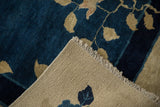 The tightly woven, hand-knotted foundation of an antique Peking carpet next to its deep blue pile.