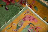 The hand-knotted back and corner fringe of a vintage Chinese Art Deco rug.
