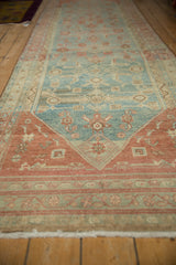 Low angle perspective down the distressed Malayer runner, highlighting its soft, worn texture.