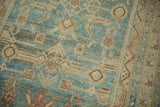 Time-softened abrash and worn texture on a Persian Malayer runner with a Herati lattice design.