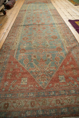 Rhythmic Herati lattice pattern seen down the elongated field of a vintage Malayer runner rug.