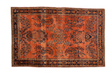 Transitional Sarouk rug in dusty rose with navy blue floral motifs and subtle abrash, 4'3