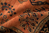 Transitional Sarouk rug, with curled pile highlighting speckled abrash in terra cotta and navy.
