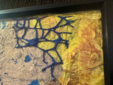 Lillian Shad art detail with blue organic web texture on crinkled yellow and gold.