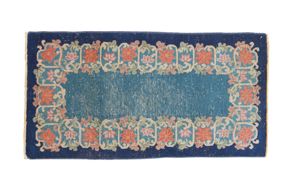 Vintage Chinese Art Deco runner with cobalt blue floral border and open sky blue field.