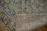 Vintage distressed Hamadan runner showing the pale blue pile texture, even wear, and hand-knotted back.