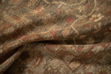 Texture of antique Mahal rug pile with mostly even wear, highlighting faded olive, beige, and terra cotta floral motifs.