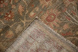 Antique Mahal rug folded to reveal olive, blush floral pile texture and tight woven foundation.