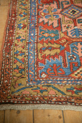 Antique Northwest Persian runner: sapphire blue starburst border meets a field of serrated leaves.