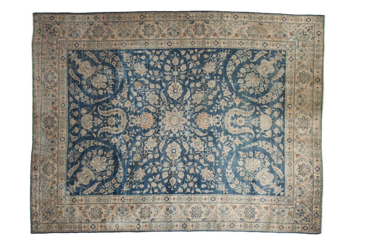 Vintage Distressed Yezd rug with allover cobalt blue field and ivory floral palmettes.