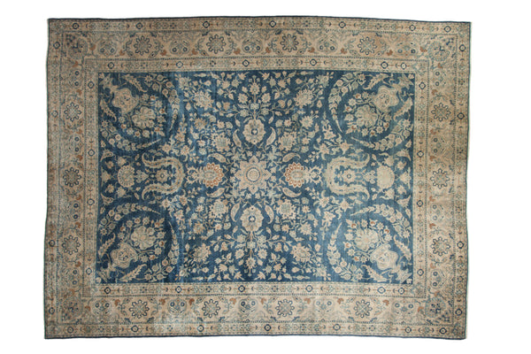 Vintage Distressed Yezd rug with allover cobalt blue field and ivory floral palmettes.