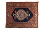 Antique Persian Bijar rug: ivory floral medallion, cobalt blue field, Herati spandrels, turtle samovar border.